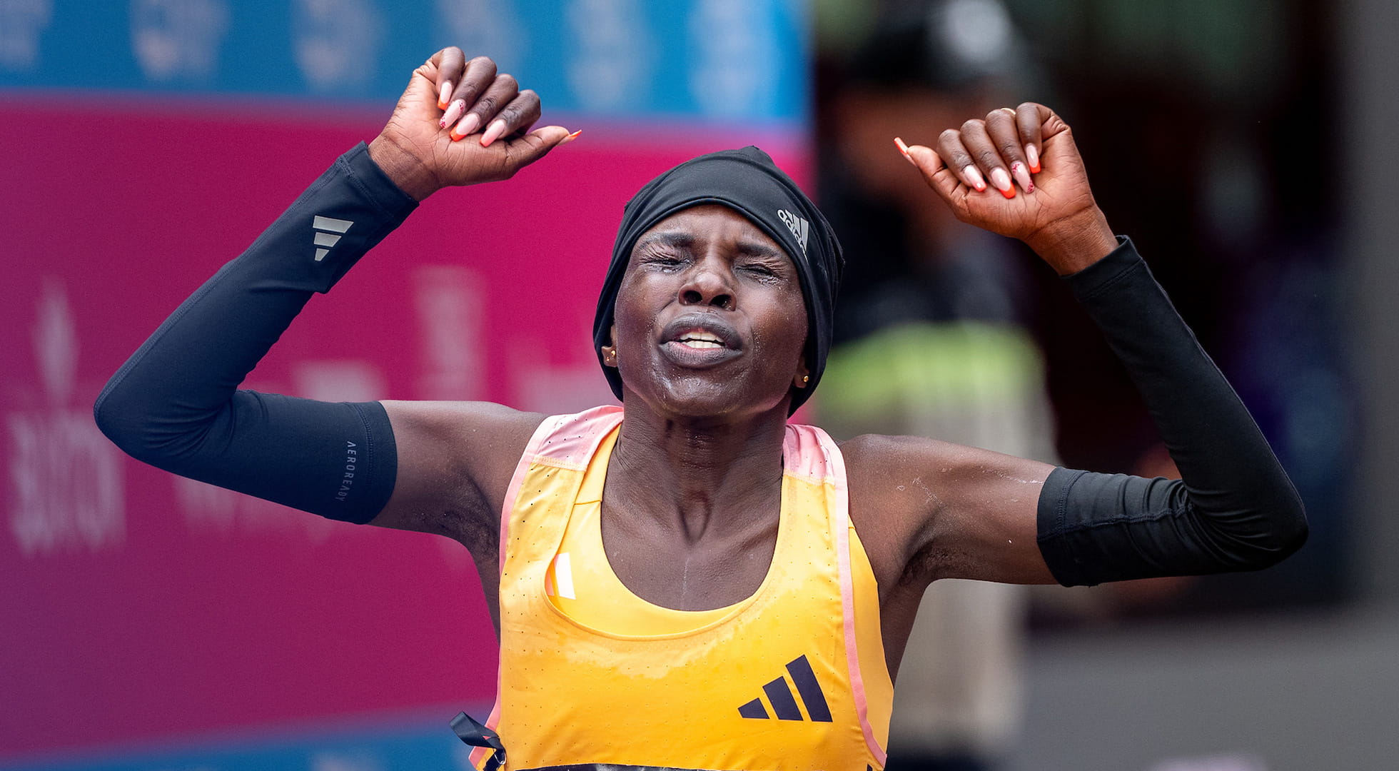 Peres Jepchirchir (ETH) celebrates as she crosses the finish line on The Mall to the win the Elite Women’s Race