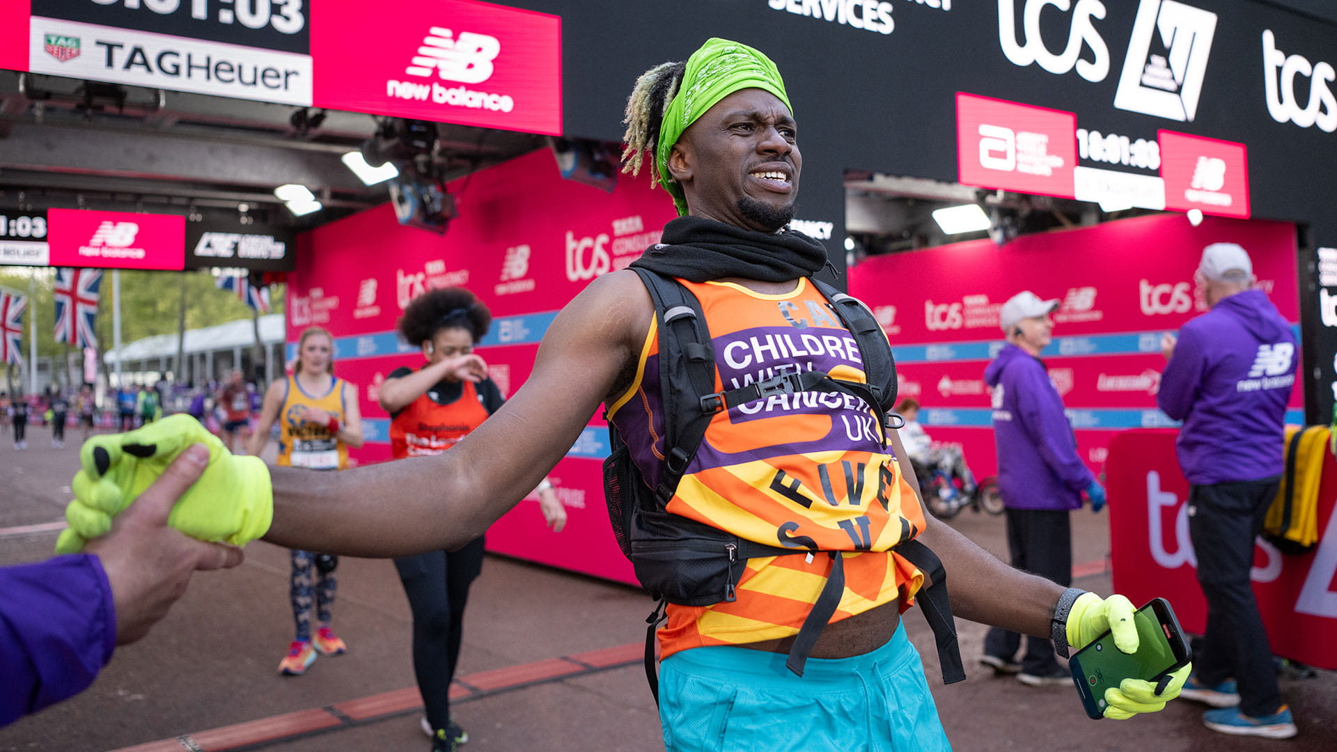 Charity runner crosses the TCS London Marathon Finish Line