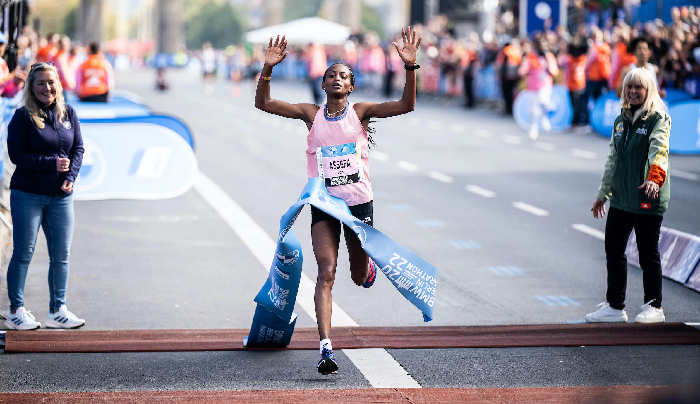 Tigist Assefa crosses the Finish Line of the 2022 Berlin Marathon