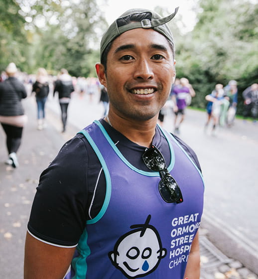 A GOSH runner smiling at the camera during his London Marathon