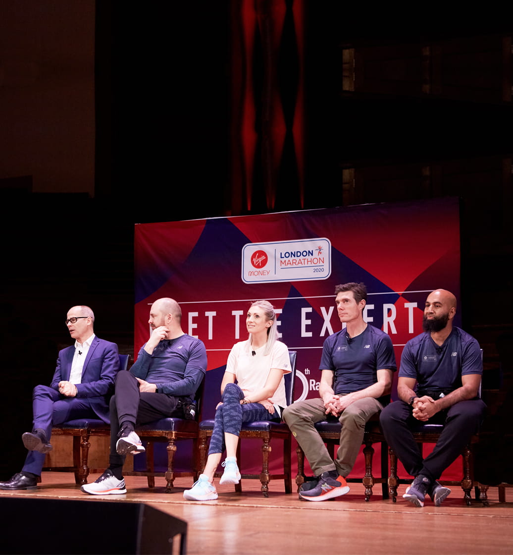 Speakers on stage at Meet the Experts