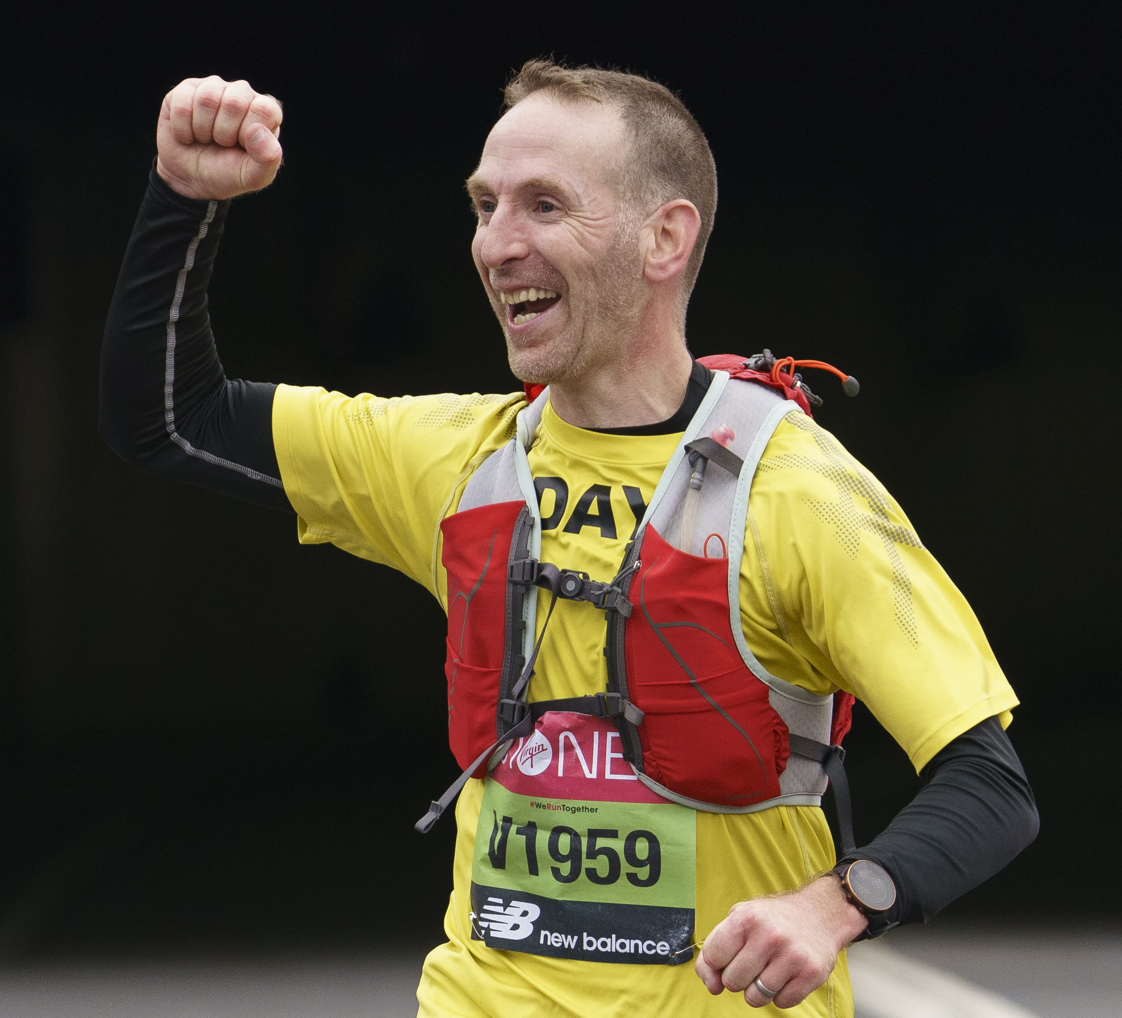 A runner celebrates during the London Marathon