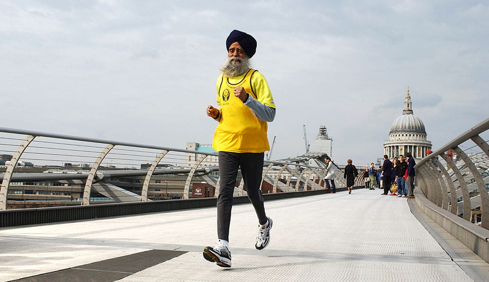 Fauja Singh running on the Millenium Bridge