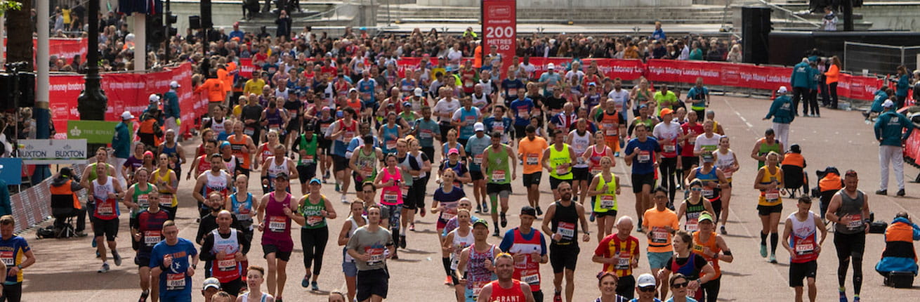 Runners approach the Finish Line on The Mall at the Virgin Money London Marathon
