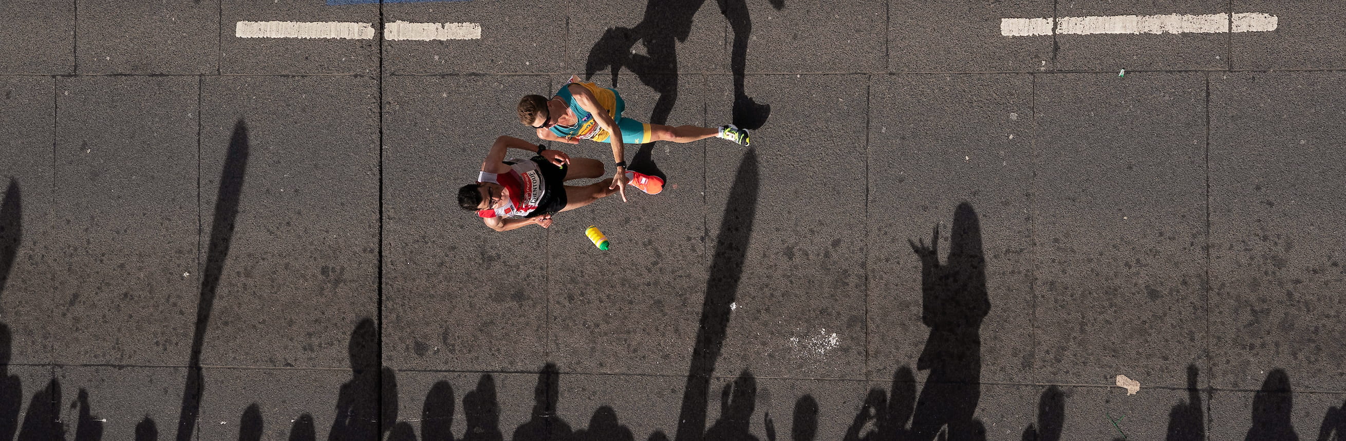 Michael Roeger AUS throws a drinks bottle to a volunteer during the T46 Men World Para Athletics Marathon Championships