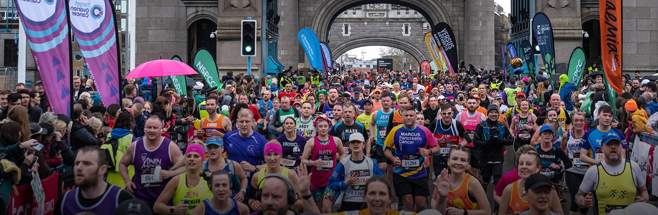 Mass participants at Tower Bridge (2023 TCS London Marathon)