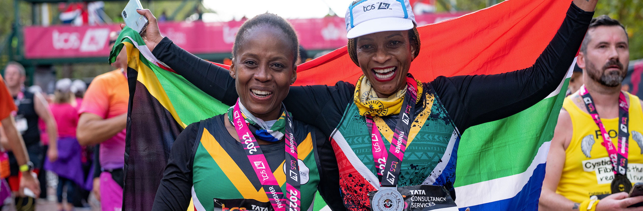 Joyful participants at the TCS London Marathon Finish Line