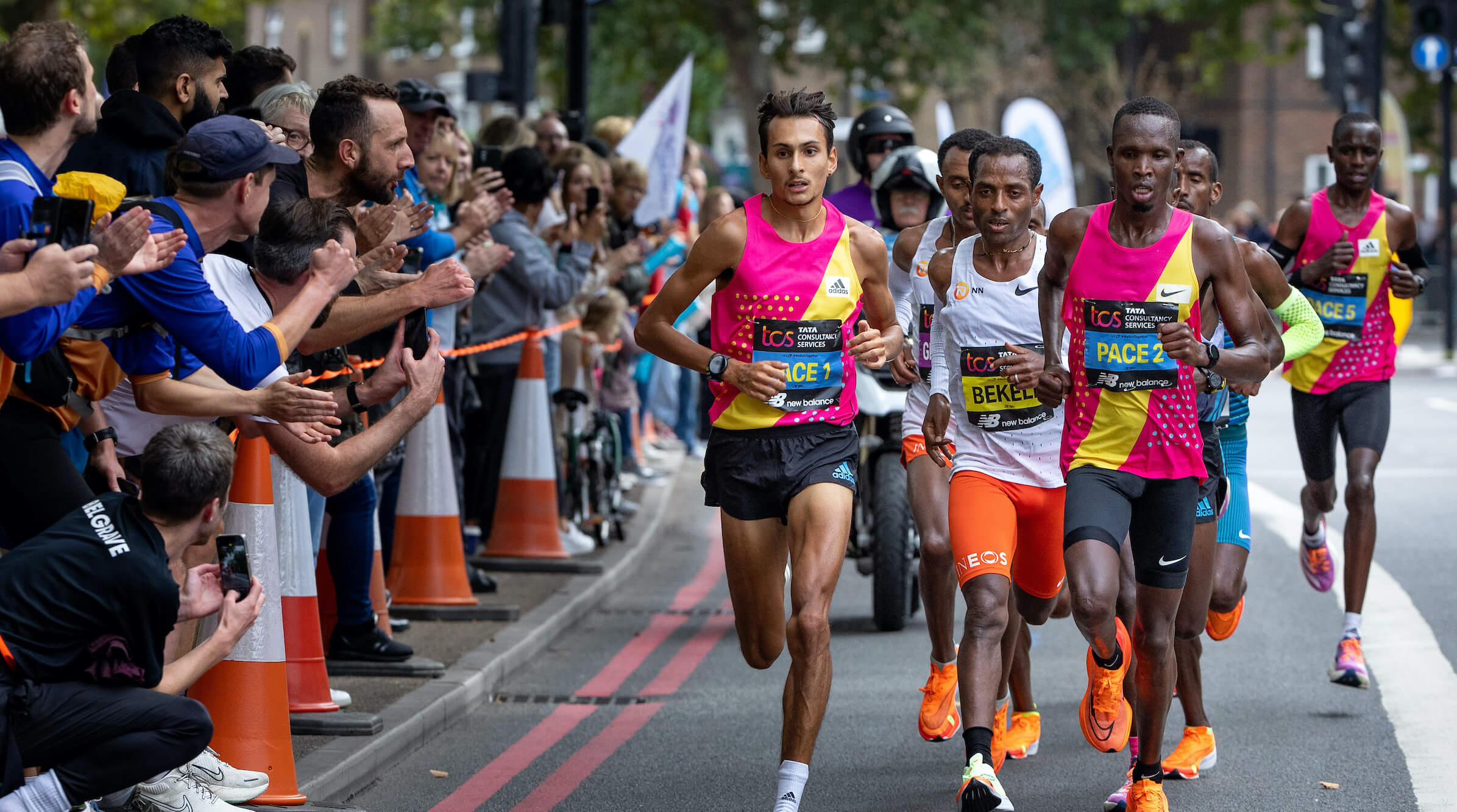 A group of elite men are cheered on at the TCS London Marathon