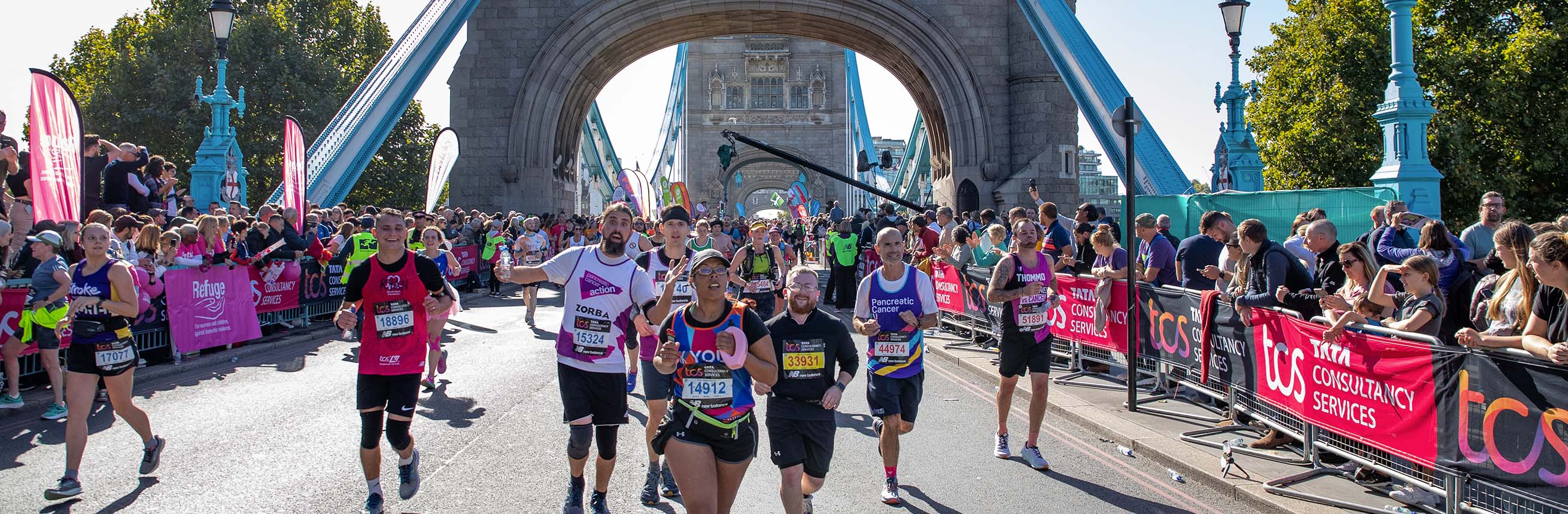 Runners cross Tower Bridge
