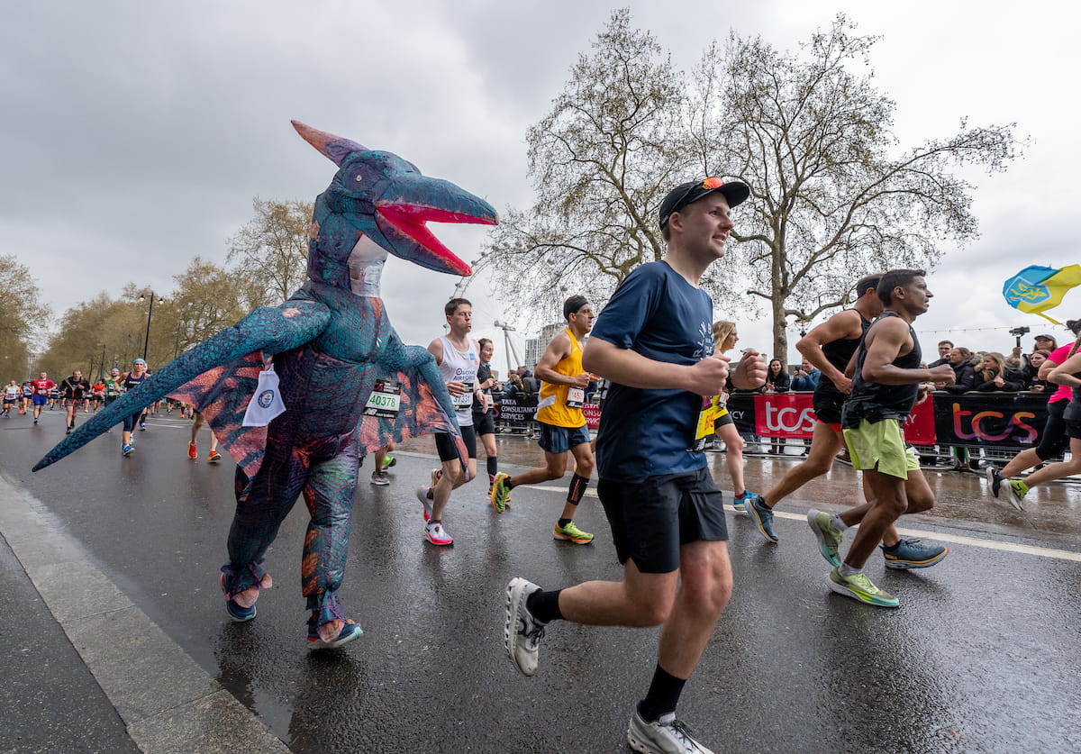 A TCS London Marathon participant dressed as a dinosaur