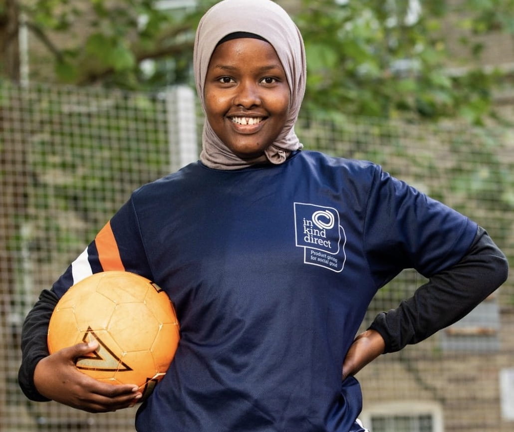 Jawahir Rolle holding a football