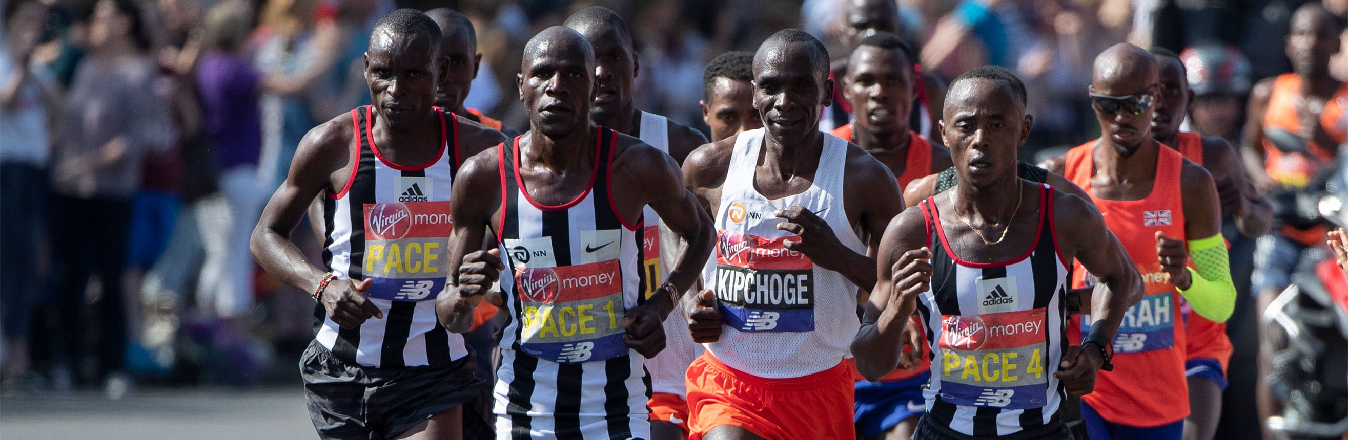 Eliud Kipchoge runs with pacemakers at the London Marathon