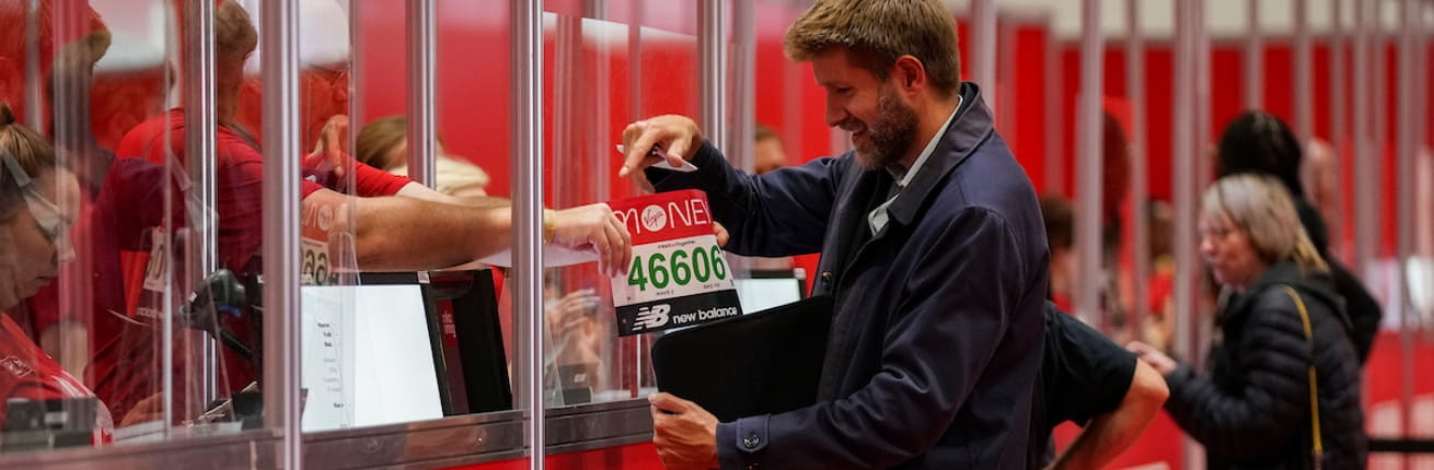 A participant registers for the 2021 Virgin Money London Marathon