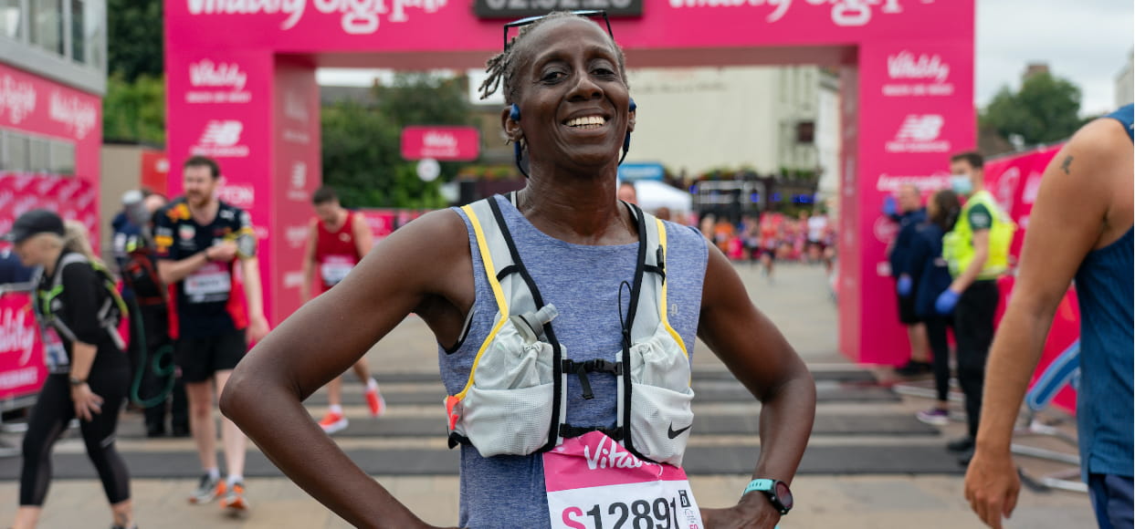 A 2021 Vitality Big Half runner is all smiles after completing the race