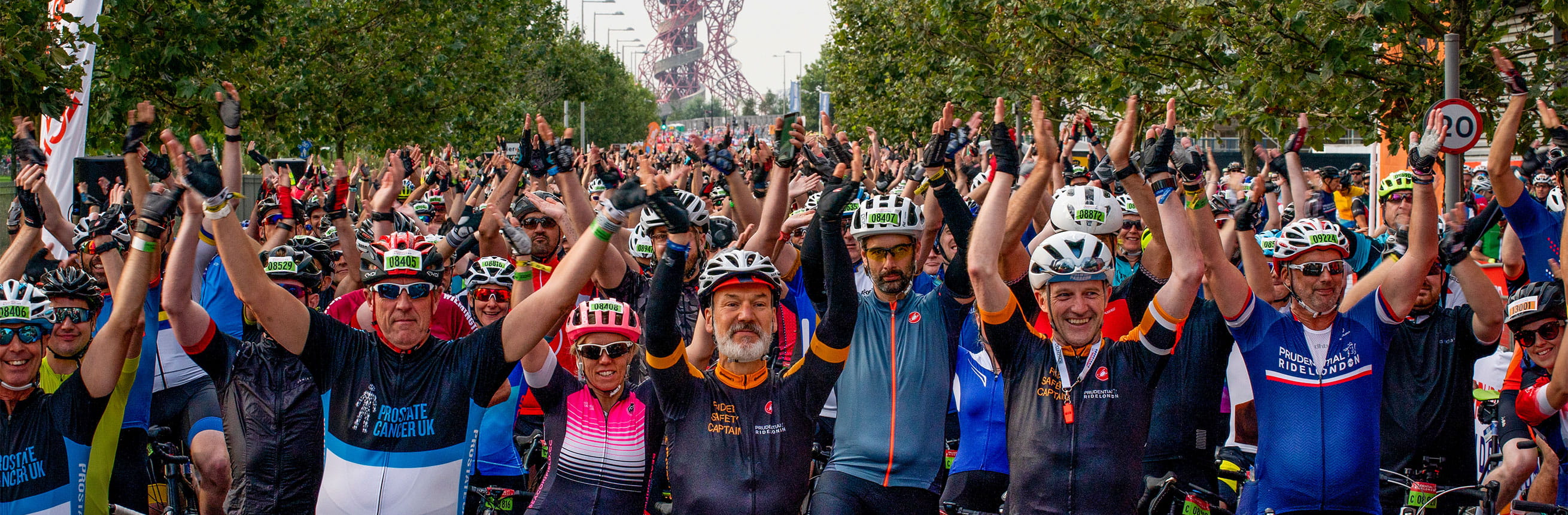 The riders clap at the start line for RideLondon as part of The RideLondon Sportives