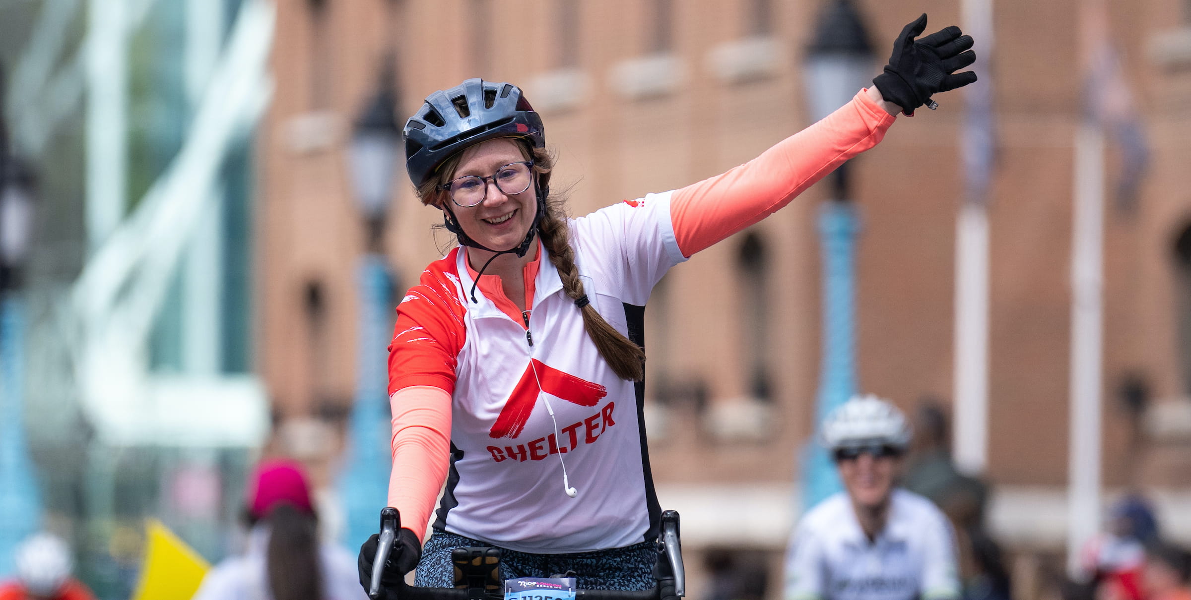 A waving participant in the RideLondon sportive