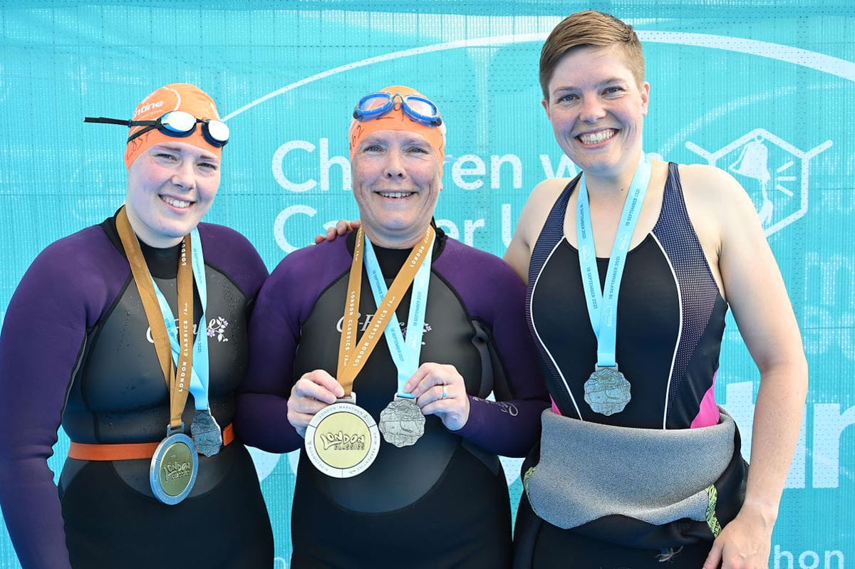 Swimmers wear Swim Serpentine medals