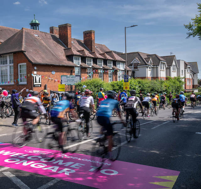 Cyclists going through Chipping Ongar during Ford RideLondon 2024
