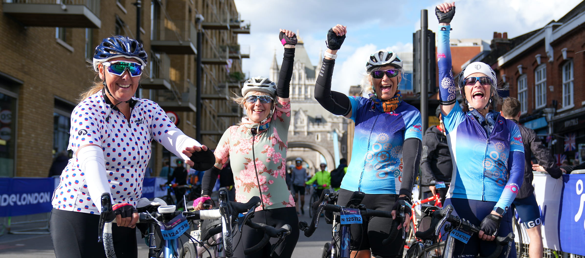 A group of cheering participants in the RideLondon-Essex sportive
