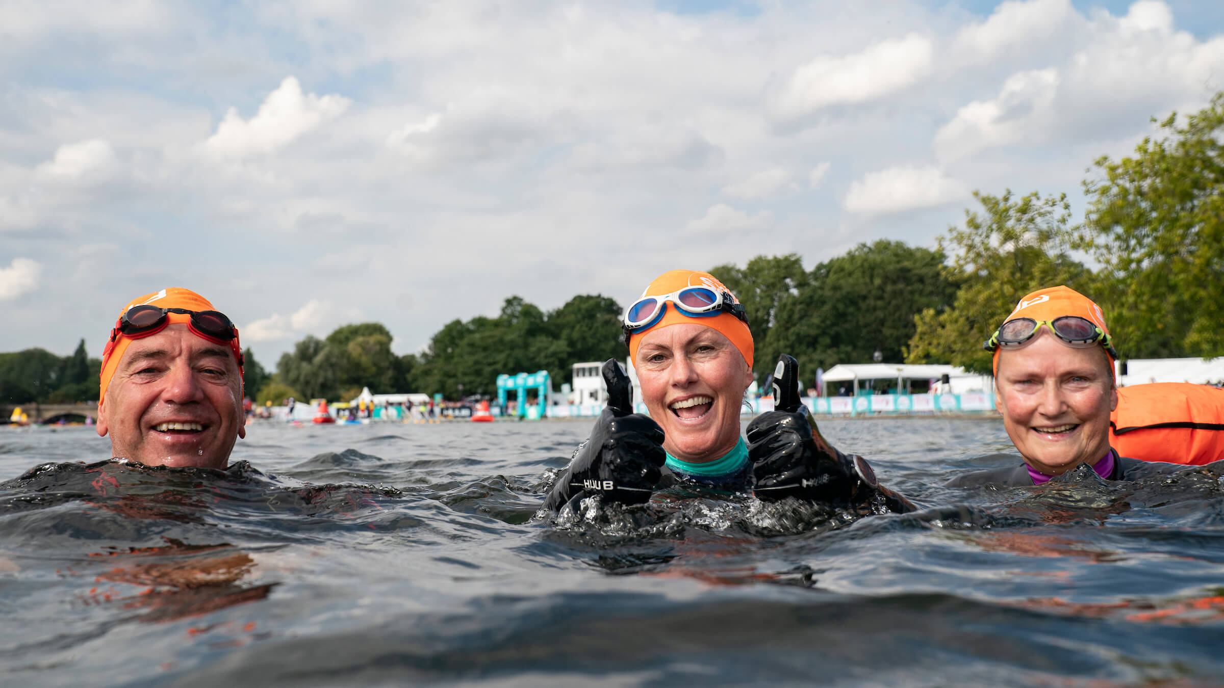 Smiling swimmers in the Serpentine lake