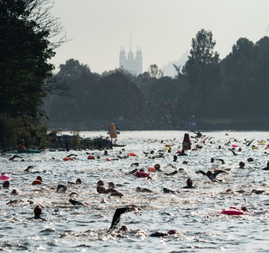 General view of swimmers in action at the Children With Cancer UK Swim Serpentine on Saturday 18th September 2021.
