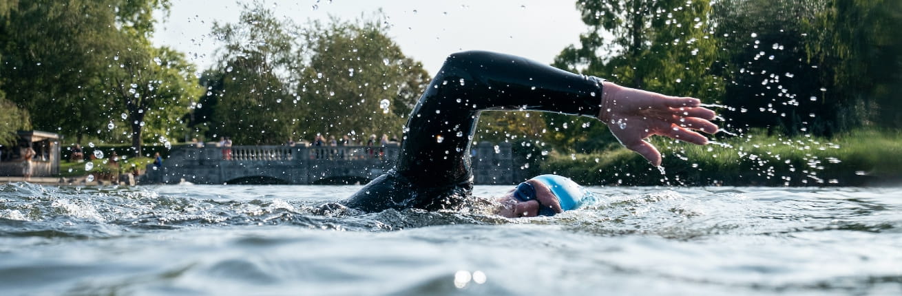 A swimmer nears the finish in the half-mile event