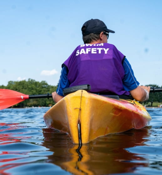 A safety kayaker at the Children With Cancer UK Swim Serpentine on Saturday 18th September 2021