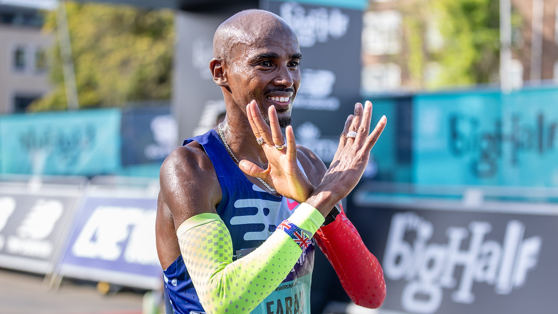 Sir Mo Farah reacts after crossing the finish line in London for the final time 