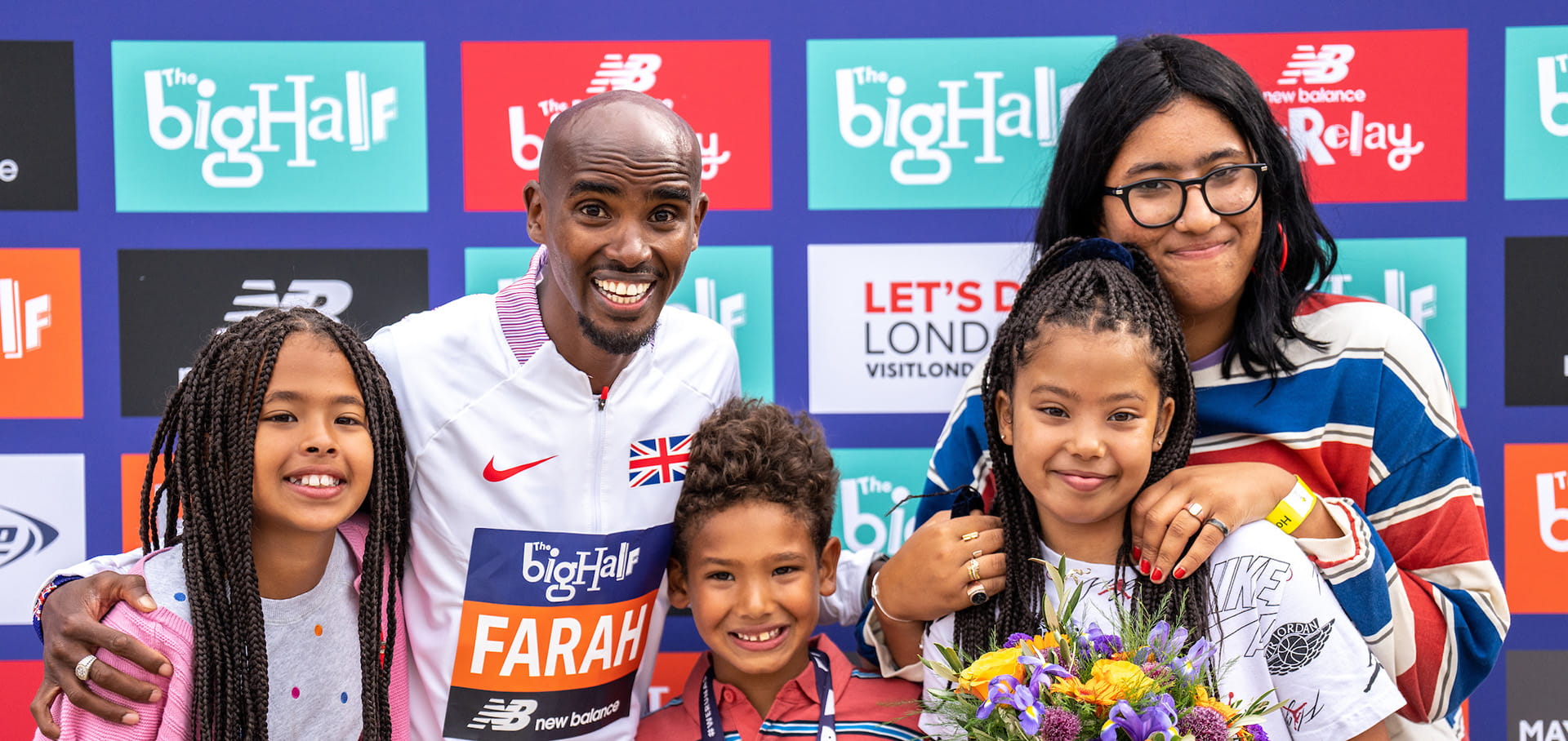Mo Farah with his wife and children at end of The Big Half 2022