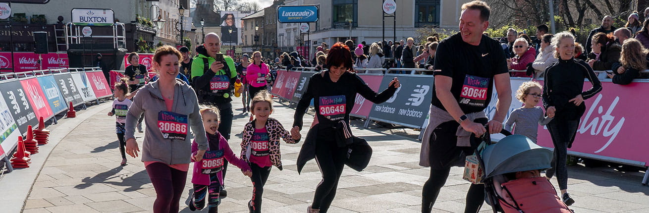 A family running at The Little Half